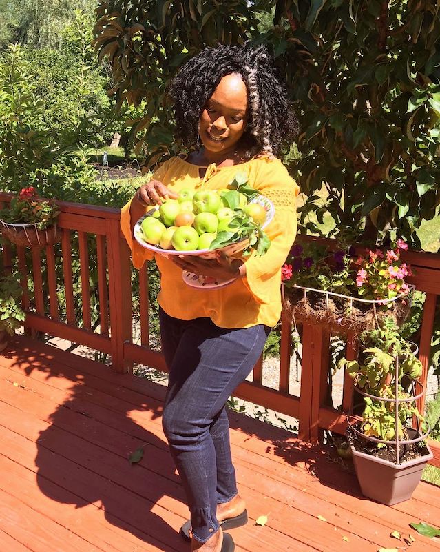 Iby Ikotidem, founder of Roots Blooms and Yards